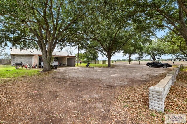 view of yard featuring a carport