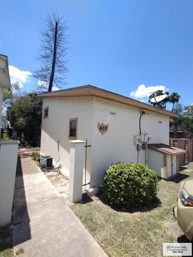 view of property exterior featuring central AC unit