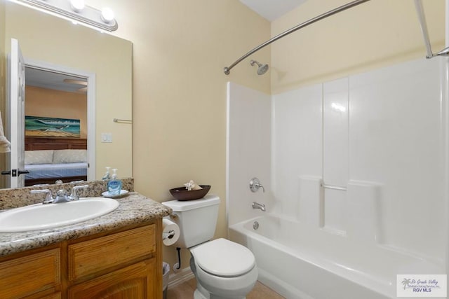 129 E Cora Lee Dr Unit 205, South Padre Island, TX 78597 - ensuite bathroom featuring toilet, vanity, bathtub / shower combination, and ensuite bathroom