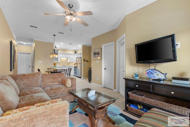 129 E Cora Lee Dr Unit 205, South Padre Island, TX 78597 - living room featuring light tile patterned floors, visible vents, a ceiling fan, and crown molding