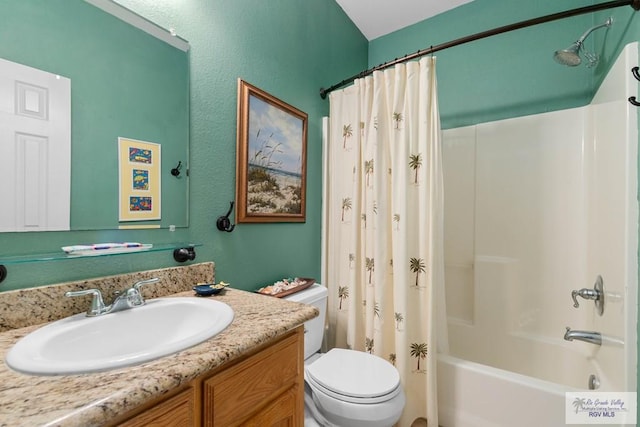 129 E Cora Lee Dr Unit 205, South Padre Island, TX 78597 - bathroom with toilet, shower / bath combo with shower curtain, and vanity
