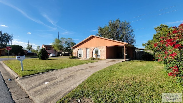 ranch-style home featuring a front yard