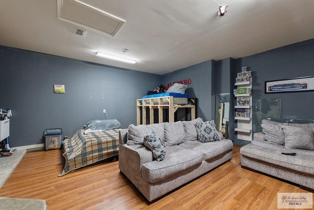 bedroom featuring wood-type flooring