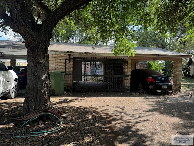 view of home's exterior with a carport