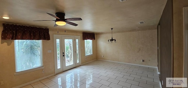 1626 N Shore Dr, Port Isabel, TX 78578 - foyer featuring a ceiling fan, baseboards, light tile patterned flooring, and crown molding