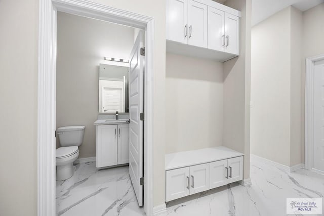 5359 Sidekick Ave, Brownsville, TX 78526 - bathroom featuring marble finish floors and vanity
