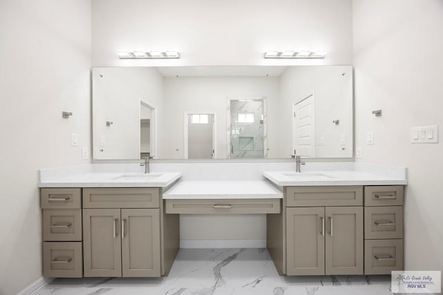 5359 Sidekick Ave, Brownsville, TX 78526 - bathroom with marble finish floors, double vanity, and a shower