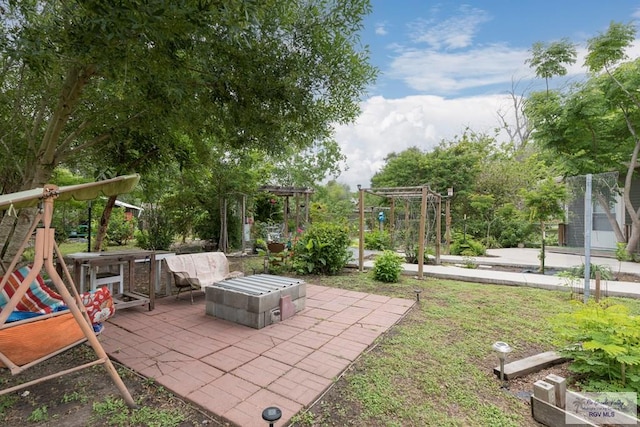 701 S Parker Rd, La Feria, TX 78559 - view of yard with a patio area and a pergola