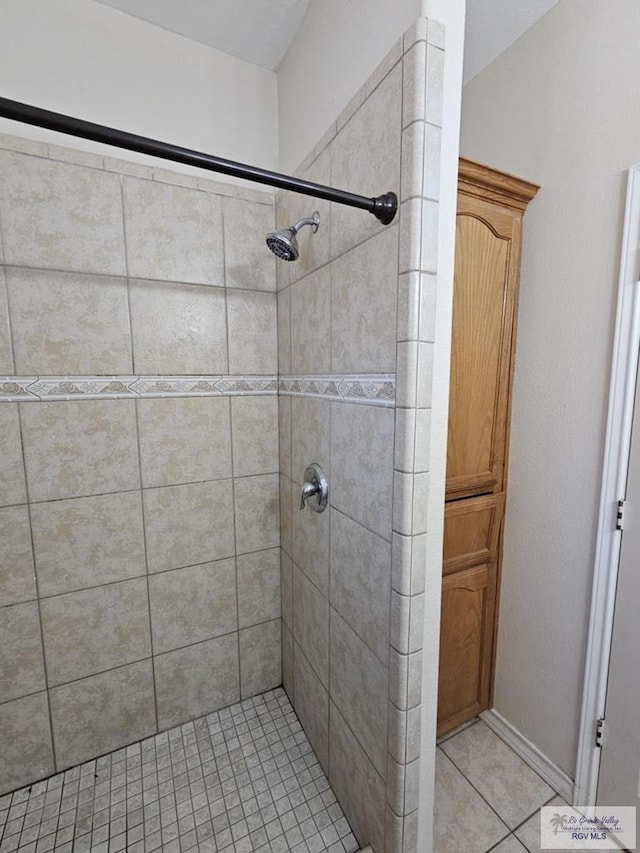 2884 Gibraltar St, Brownsville, TX 78520 - bathroom with tiled shower and tile patterned floors