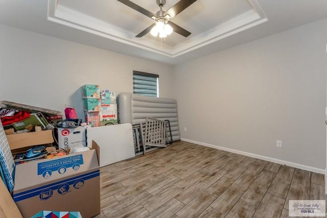 storage area featuring ceiling fan