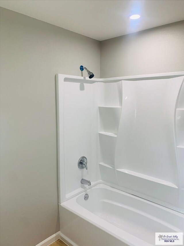 1218 S 16th St, Harlingen, TX 78550 - bathroom featuring bathtub / shower combination and recessed lighting