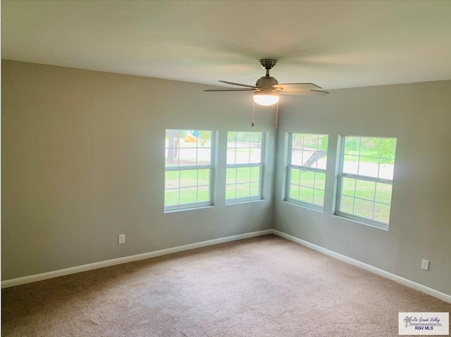 1218 S 16th St, Harlingen, TX 78550 - unfurnished room with carpet floors and ceiling fan