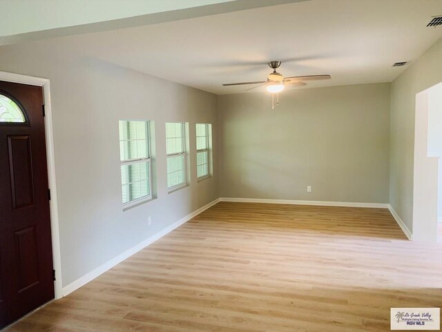 foyer featuring ceiling fan and light hardwood / wood-style flooring