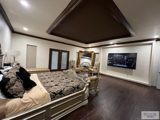 bedroom with dark hardwood / wood-style floors, ornamental molding, and french doors