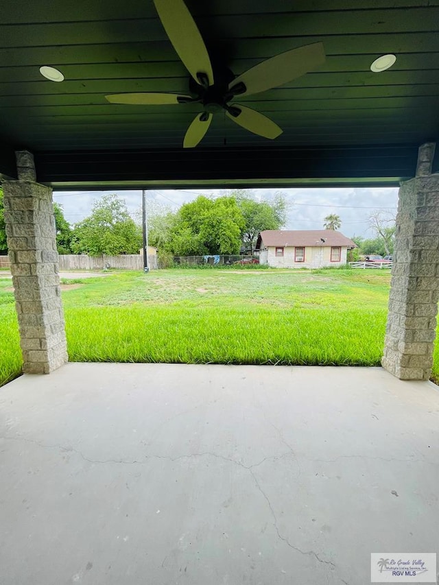 view of patio / terrace featuring ceiling fan