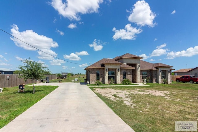 view of front of home with a front yard