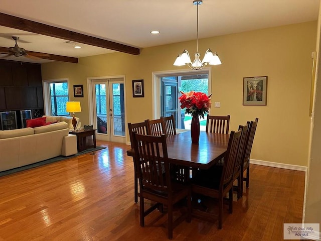 dining space with recessed lighting, wood finished floors, baseboards, french doors, and beamed ceiling