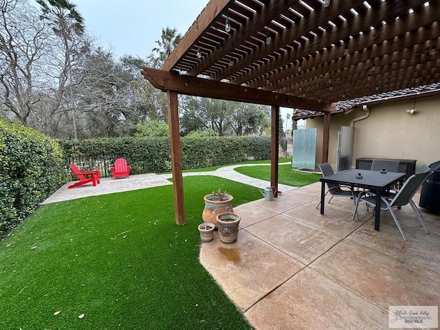 117 Palm Valley Cir, Harlingen, TX 78552 - view of patio / terrace with a pergola and outdoor dining area