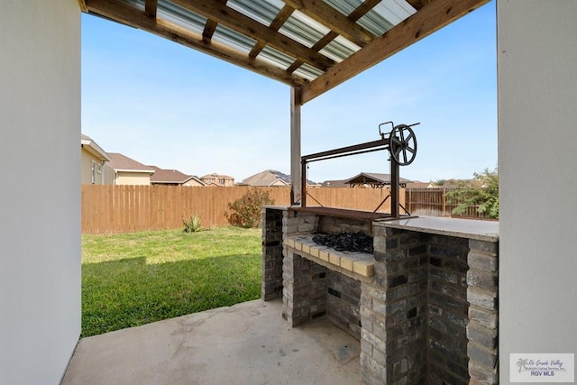 view of patio featuring an outdoor bar