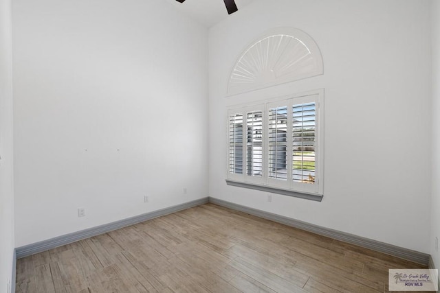 unfurnished room featuring ceiling fan and light hardwood / wood-style flooring