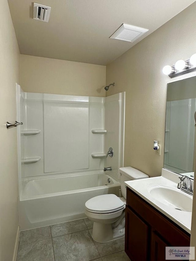 full bathroom with vanity, tile patterned flooring, washtub / shower combination, and toilet