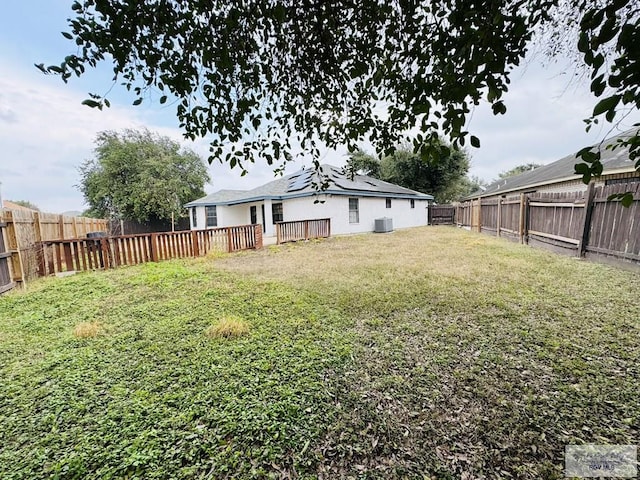 2200 E 19th St, Mission, TX 78572 - view of yard featuring central air condition unit