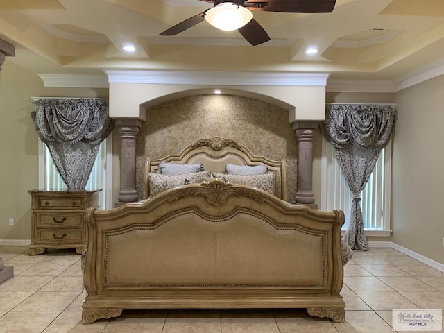 tiled bedroom with ornate columns, ceiling fan, and crown molding