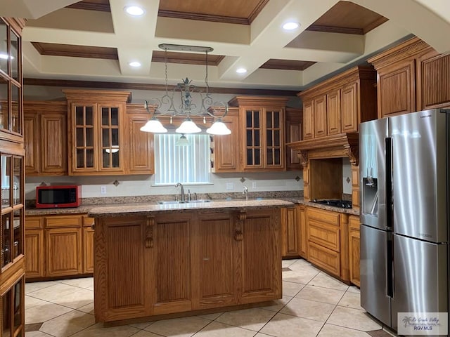 kitchen featuring sink, hanging light fixtures, stainless steel appliances, coffered ceiling, and ornamental molding