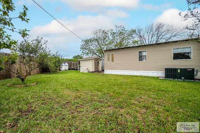 413 Cooper Ln Unit 24, 25, 26, La Feria, TX 78559 - view of yard featuring a storage unit, cooling unit, and an outdoor structure