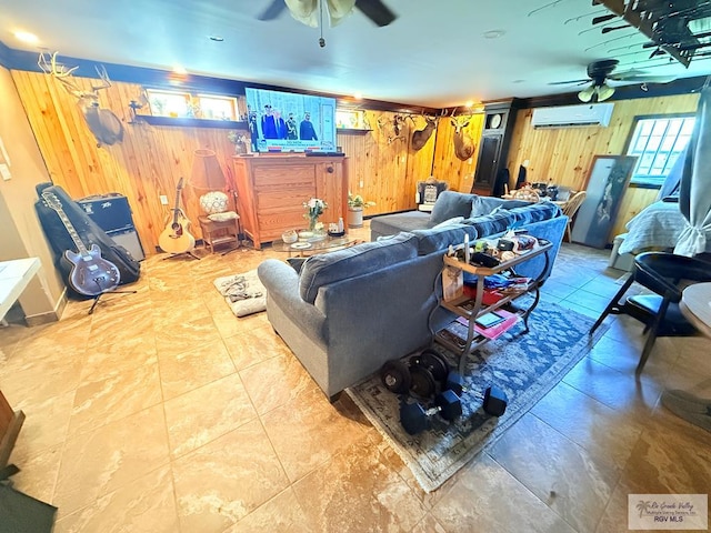 413 Cooper Ln Unit 24, 25, 26, La Feria, TX 78559 - living room featuring a ceiling fan, wood walls, a wall mounted air conditioner, and healthy amount of natural light