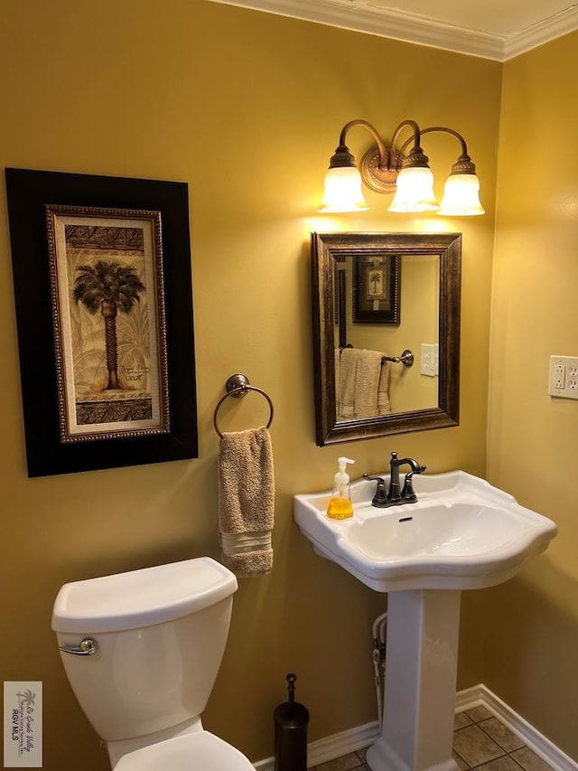 413 Cooper Ln Unit 24, 25, 26, La Feria, TX 78559 - half bath with crown molding, baseboards, tile patterned flooring, and toilet