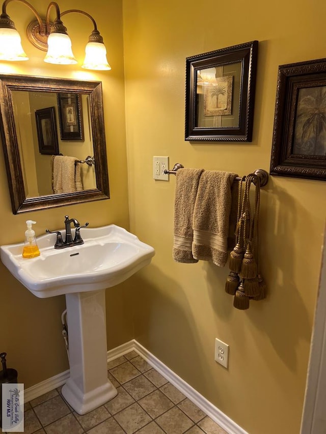 413 Cooper Ln Unit 24, 25, 26, La Feria, TX 78559 - bathroom with tile patterned floors and baseboards