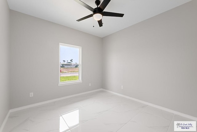 spare room with ceiling fan