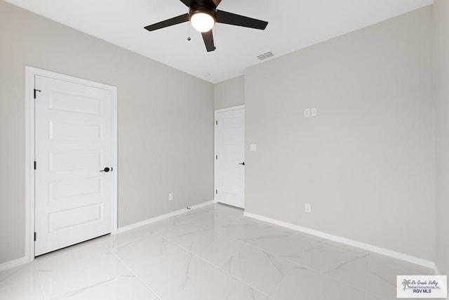 unfurnished bedroom featuring ceiling fan