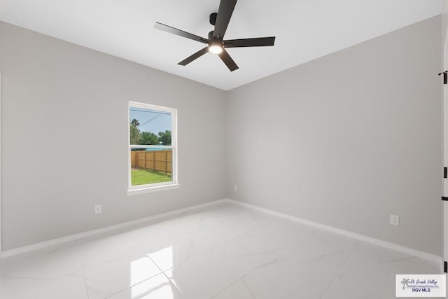 spare room featuring ceiling fan