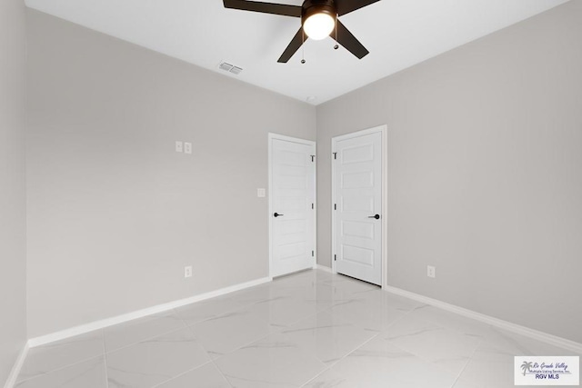 unfurnished room featuring ceiling fan