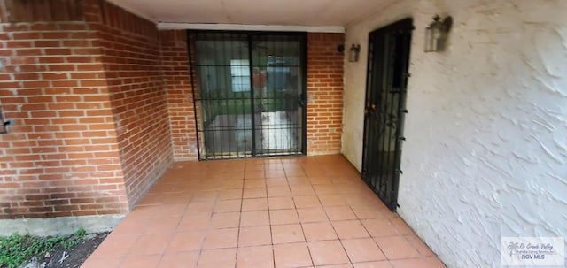 4853 Paseo Del Rey Dr, Brownsville, TX 78526 - property entrance featuring brick siding