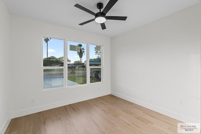 1421 6th St, Harlingen, TX 78550 - empty room featuring a ceiling fan, baseboards, and light wood finished floors