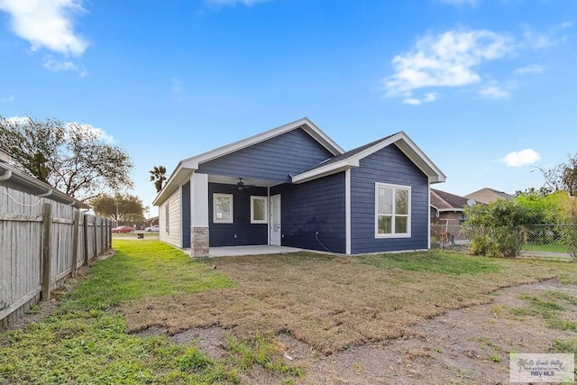 1421 6th St, Harlingen, TX 78550 - rear view of property with a ceiling fan and a patio area