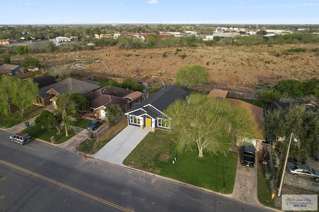1421 6th St, Harlingen, TX 78550 - aerial view of property's location with nearby suburban area