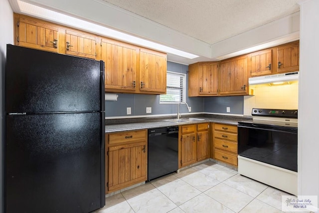 kitchen with backsplash, sink, light tile patterned floors, and black appliances