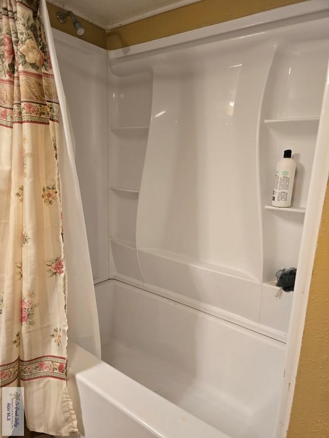 bathroom with curtained shower