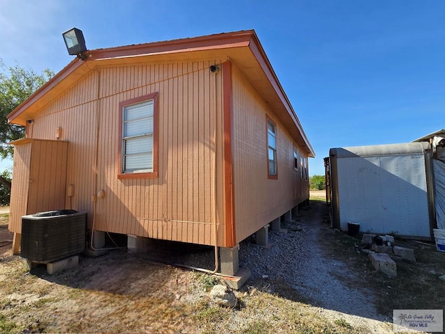 view of property exterior featuring central AC unit