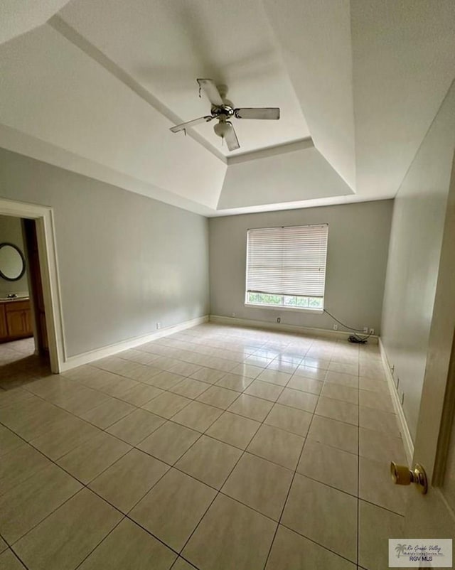 34 Picadilly Cir, Brownsville, TX 78526 - unfurnished room with tile patterned floors, a raised ceiling, and ceiling fan
