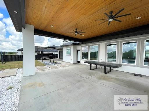 view of patio featuring ceiling fan