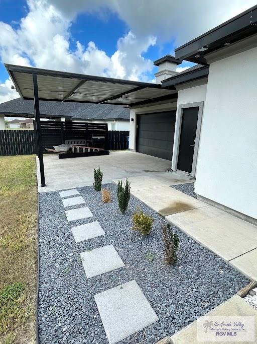 exterior space with a garage