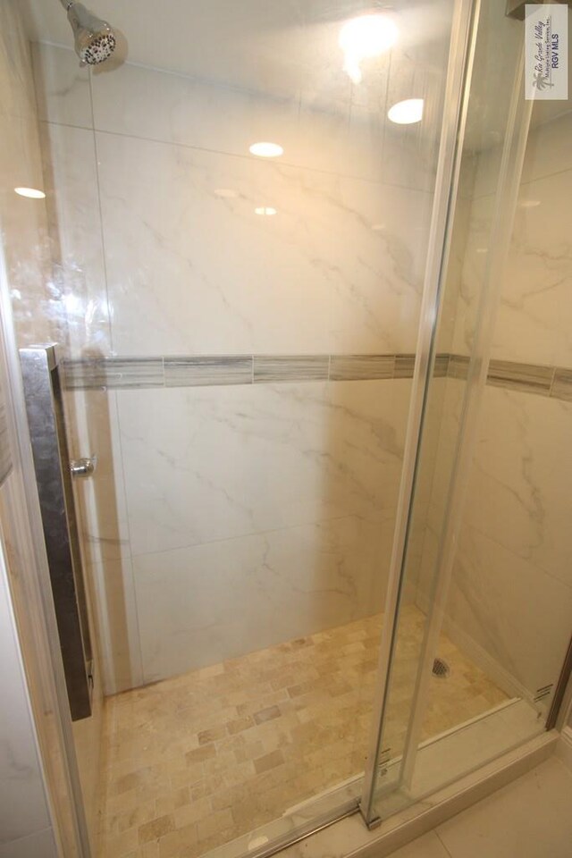 200 Padre Blvd Unit 2307, South Padre Island, TX 78597 - bathroom featuring a shower with door