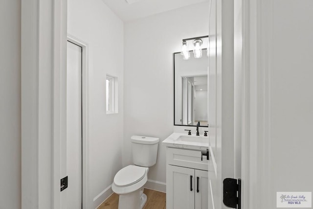 29002 Reynolds Dr # 18, La Feria, TX 78559 - half bath with vanity and wood finished floors