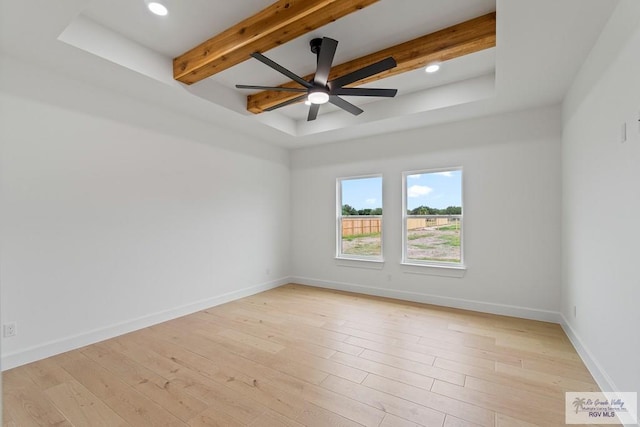 29002 Reynolds Dr # 18, La Feria, TX 78559 - empty room with beamed ceiling, a ceiling fan, light wood-style floors, and recessed lighting