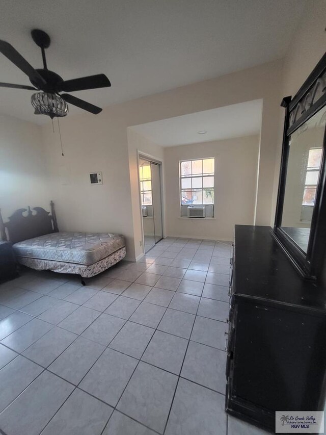 living room with light hardwood / wood-style flooring and ceiling fan